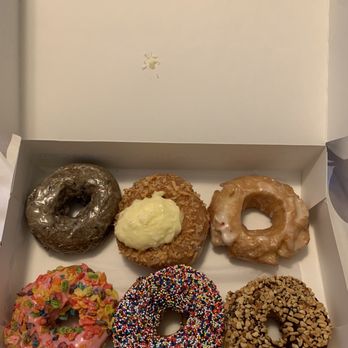 Donut King - Fruity Pebbles, Sour cream, Blueberry Cake, Peanut, Coconut, and Candy Ring. - Donuts Near Me - Winter Park, Florida