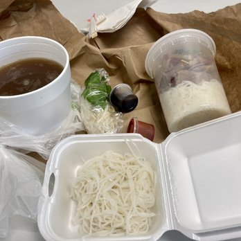 Pho&Mi - 'Large' Brisket and rare steak Phô to-go $16+ plus $3+ for extra rice noodles Tabasco brand siracha pictured will ruin the taste! :-( - Vietnamese Near Me - Puyallup, Washington