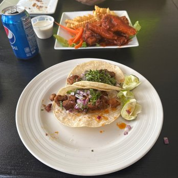Taco Sensacion - Pastor taco and wings in the background! Yummo - Mexican Near Me - Yacolt, Washington