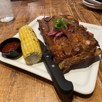Scratch Kitchen - Lilikoi BBQ Short Ribs with fried Crispy Smashed Potatoes and corn - Breakfast & Brunch Near Me - Honolulu, Hawaii Scratch Kitchen - Lilikoi BBQ Short Ribs with fried Crispy Smashed Potatoes and corn - Breakfast & Brunch Near Me - Honolulu, Hawaii