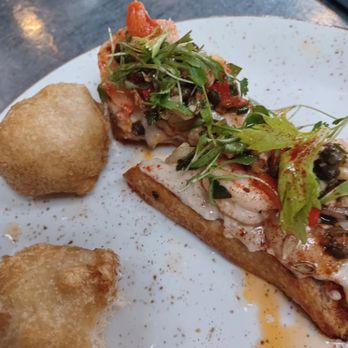 The Ice Plant - Blue crab bigness and local shrimp toast - Cocktail Bars Near Me - St. Augustine, Florida