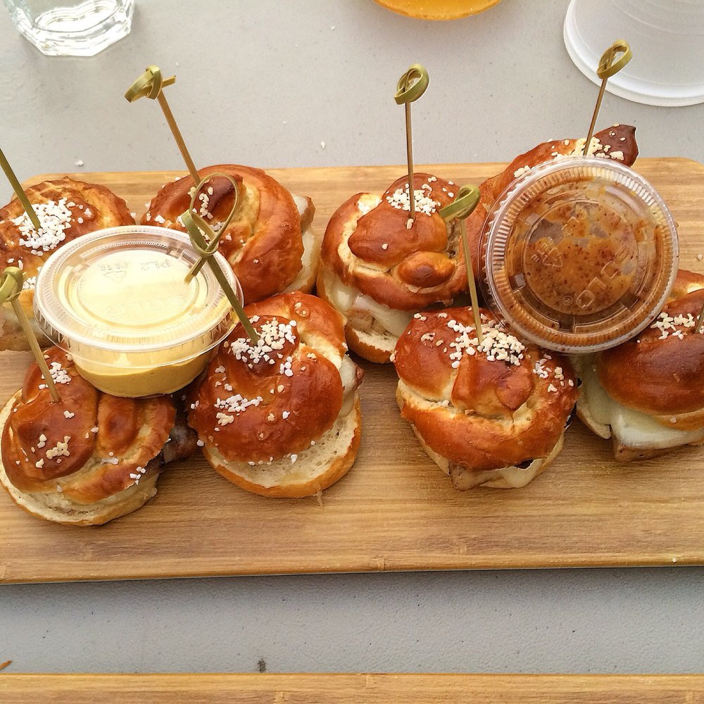 Plattduetsche Park - Little Bavarians - Eight mini pretzel slider rolls filled with sliced brats, Swiss cheese & bacon (THIS IS A MUST TRY!!) - German Near Me - Franklin Square, New York Plattduetsche Park - Little Bavarians - Eight mini pretzel slider rolls filled with sliced brats, Swiss cheese & bacon (THIS IS A MUST TRY!!) - German Near Me - Franklin Square, New York
