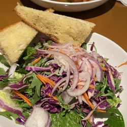 Stella's - Small garden salad with toasted bread. Good size. Fresh and crunchy. Stella's provencher winnipeg mb
