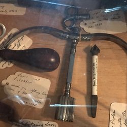 Surgical tool for putting holes in skull.