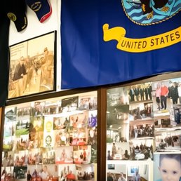 The walls are adorned with military props and recognitions. The walls are adorned with military props and recognitions.