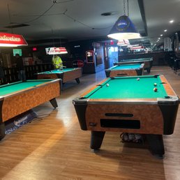 Lots of pool tables Lots of pool tables