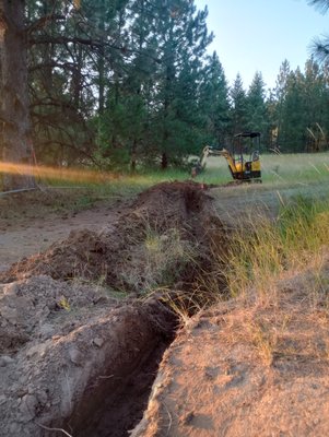 trench from electrical panel to pole barn - customer wanted a 155ft trench from meter electrical panel to existing pole barn. he wanted a 2ft deep trench that we could run conduit for sub panel inside pole barn trench from electrical panel to pole barn - customer wanted a 155ft trench from meter electrical panel to existing pole barn. he wanted a 2ft deep trench that we could run conduit for sub panel inside pole barn