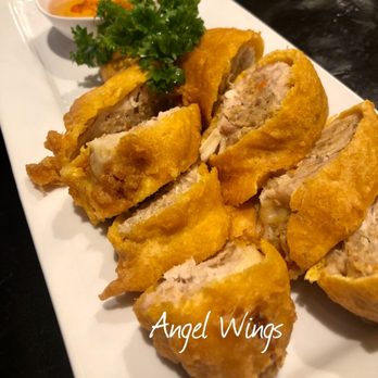 Asian Spicy - Angel Wings! Stuffed chicken wing drummettes with shrimp, pork, onion, and glass noodles served with sweet chili dipping sauce. - Thai Near Me - Amarillo, Texas Asian Spicy - Angel Wings! Stuffed chicken wing drummettes with shrimp, pork, onion, and glass noodles served with sweet chili dipping sauce. - Thai Near Me - Amarillo, Texas
