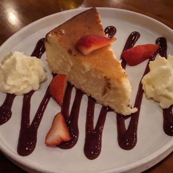 Gypsy Kitchen DC - "burnt" Basque cheesecake with berry wine compote - Tapas/Small Plates Near Me - Washington, DC, District of Columbia Gypsy Kitchen DC - "burnt" Basque cheesecake with berry wine compote - Tapas/Small Plates Near Me - Washington, DC, District of Columbia