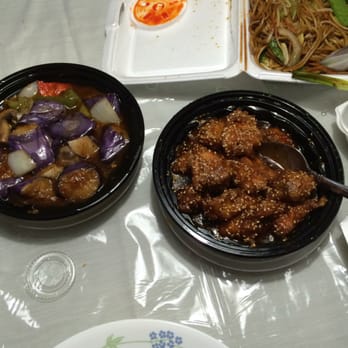 Wok One - Eggplants in garlic sauce on left & sesame chicken on right. - Chinese Near Me - Meadows Place, Texas Wok One - Eggplants in garlic sauce on left & sesame chicken on right. - Chinese Near Me - Meadows Place, Texas