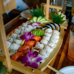 Mora - Oak Park - Sushi rolls on a boat
