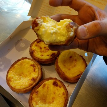 Xinfa Bakery - Inside of just-out-of-the-oven egg tart (delicious, but let it cool a bit and it's even better) - Bakeries Near Me - Brooklyn, New York Xinfa Bakery - Inside of just-out-of-the-oven egg tart (delicious, but let it cool a bit and it's even better) - Bakeries Near Me - Brooklyn, New York