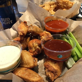 Empire Burger - Naked Chicken wings with buffalo sauce and Asian firecracker sauce on the side, onion rings - Burgers Near Me - Breckenridge, Colorado