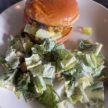 Rattlesnake Club - Cheese burger and side of Cesar salad - New American Near Me - Reno, Nevada Rattlesnake Club - Cheese burger and side of Cesar salad - New American Near Me - Reno, Nevada