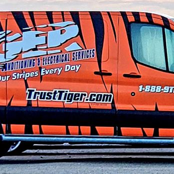 Aggressive - Example of Van wrap for plumbing company, HVAC, & electrical - Vehicle Wraps Near Me - Highland, Illinois