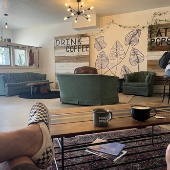 River Road Coffee and Popsicles - a man sitting on a couch - Coffee & Tea Near Me - Cocoa, Florida