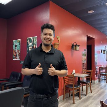 Peru  Peruvian and Latin Cuisine - Alejandro co-owner with his parents of the restaurant. - Latin American Near Me - Middletown, Kentucky