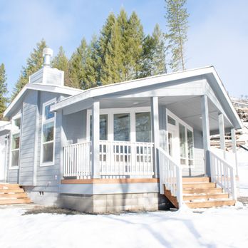 Friesen Construction - a house in the snow - General Contractors Near Me