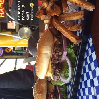 Nuttys junkyard Grill - (Don't mind the text)  These burgers are well-sized and larger than the average burger.  Fresh. and tasty.  so very tasty. - American Near Me - Arlington, Washington