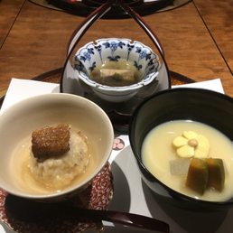 Course 1: Sesami tofu(?), flavored rice with eel, white miso soup. Course 1: Sesami tofu(?), flavored rice with eel, white miso soup.