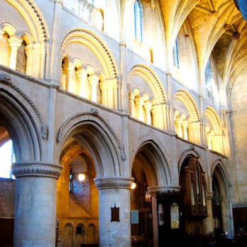 Malmesbury Abbey - North nave arcade: robust Norman piers and a more delicate triforium (c. 1130-1180) rising to the decorated gothic clerestory - Churches Near Me - Malmesbury, WIL