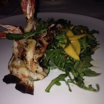 Caffe Di Notte - Gulf shrimp in a mango, cucumber and Asian chili sauce over a bed of arugula. - Italian Near Me - Sunset, Florida Caffe Di Notte - Gulf shrimp in a mango, cucumber and Asian chili sauce over a bed of arugula. - Italian Near Me - Sunset, Florida