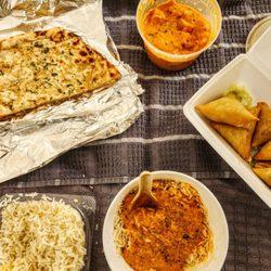 Taz Indian Restaurant - Tikka masala garlic naan mini samosas