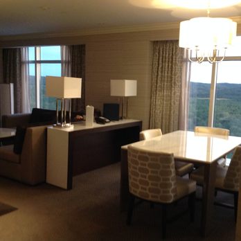 Grand Pequot Tower - Separate living room included wet bar, dining table and sectional sofa. - Hotels Near Me - Mashantucket, Connecticut Grand Pequot Tower - Separate living room included wet bar, dining table and sectional sofa. - Hotels Near Me - Mashantucket, Connecticut