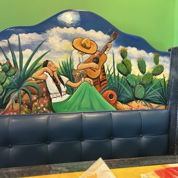 Daniel's Little Mexico - Beautifully painted booth. The decoration and paintings all around the place really created a beautiful atmosphere - Mexican Near Me - Louisville, Kentucky
