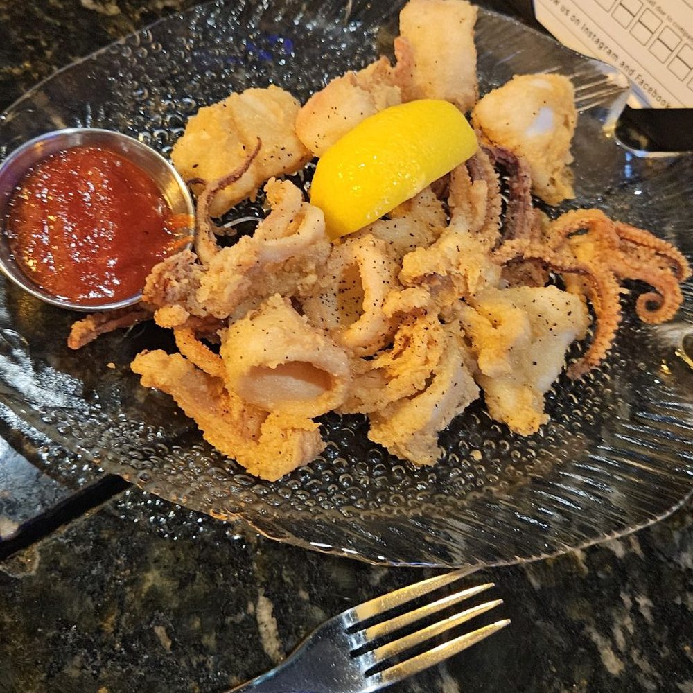 Fried calamari - portion was a little spare for price but clearly from scratch and cut from whole squid in house, with good sauce Fried calamari - portion was a little spare for price but clearly from scratch and cut from whole squid in house, with good sauce