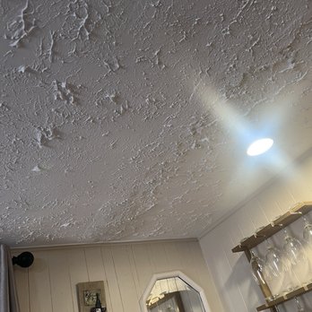 Tricon - By the wet bar in the dining room were the leak is . - Real Estate Services Near Me Tricon - By the wet bar in the dining room were the leak is . - Real Estate Services Near Me