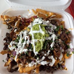 1/2 carne asada and 1/2 al pastor fries 1/2 carne asada and 1/2 al pastor fries