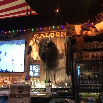 Saloon MKE - a buffalo head mounted on the wall - Cocktail Bars Near Me - Milwaukee, Wisconsin Saloon MKE - a buffalo head mounted on the wall - Cocktail Bars Near Me - Milwaukee, Wisconsin