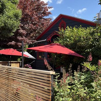 Occhi Belli - A view of the patio...where dogs are allowed were told. I was enjoying it too much to get photos inside! - Wine Bars Near Me - Seattle, Washington Occhi Belli - A view of the patio...where dogs are allowed were told. I was enjoying it too much to get photos inside! - Wine Bars Near Me - Seattle, Washington