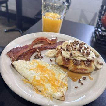 Wake Up And Waffle - Banana Pecan waffle with egg whites and bacon - Breakfast & Brunch Near Me - Sandusky, Ohio Wake Up And Waffle - Banana Pecan waffle with egg whites and bacon - Breakfast & Brunch Near Me - Sandusky, Ohio
