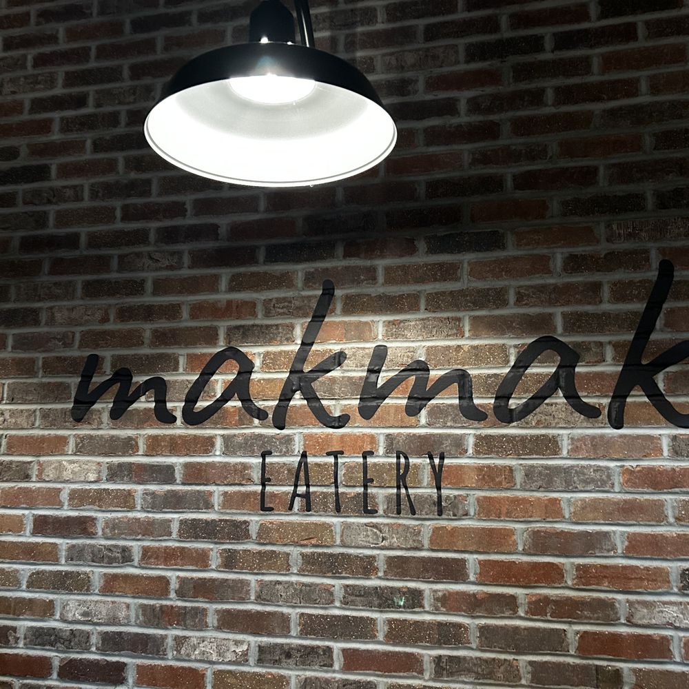 Makmak Eatery - Sign on an interior wall. The brick wall and black ceilings give it an urban feel. - Breakfast & Brunch Near Me - Cranston, Rhode Island Makmak Eatery - Sign on an interior wall. The brick wall and black ceilings give it an urban feel. - Breakfast & Brunch Near Me - Cranston, Rhode Island