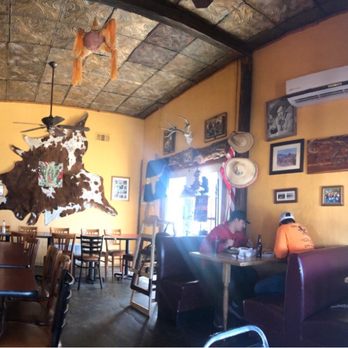 Rooster's - Indoor rustic vibe! - Tex-Mex Near Me - Vega, Texas Rooster's - Indoor rustic vibe! - Tex-Mex Near Me - Vega, Texas