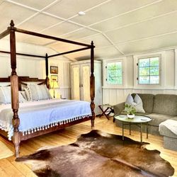 Puakea Ranch - $360 "James' Cottage" is smallest and most affordable of 4 cabins. Couples' studio sleeps 2 in king bed.