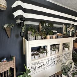 The adorable flower cart in the plant room