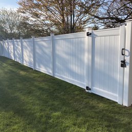 Backyard fencing with single gate. Backyard fencing with single gate.