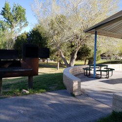 Rooney Park - Small elevated pavilion in the middle of the park next to small playground.