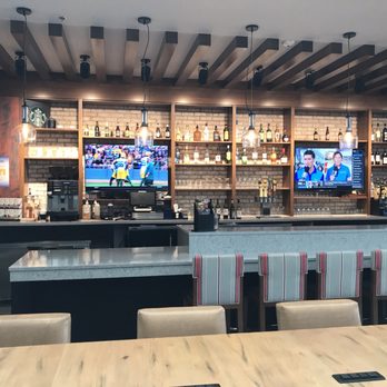 Hyatt Place Ann Arbor - Bar area, open view to/from the lobby. - Hotels Near Me - Ann Arbor, Michigan Hyatt Place Ann Arbor - Bar area, open view to/from the lobby. - Hotels Near Me - Ann Arbor, Michigan
