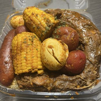 Boil City - Turkey Neck Pack with corn, potatoes, eggs, sausage, rice, and drawn Cajun butter - Slap Yo Momma Good !!! - Seafood Near Me - Beaumont, Texas Boil City - Turkey Neck Pack with corn, potatoes, eggs, sausage, rice, and drawn Cajun butter - Slap Yo Momma Good !!! - Seafood Near Me - Beaumont, Texas