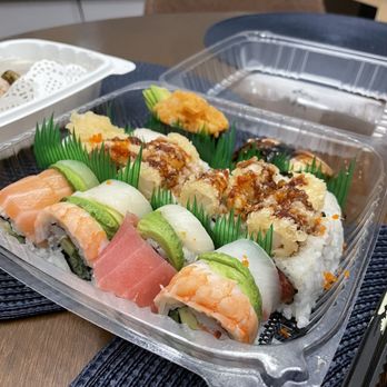 Sushi Ai - Rolls: Rainbow Roll and Under Control Roll Nigiri: Scallop, Spicy Scallop, White Fish, and Eel - Sushi Bars Near Me - Clayton, Missouri Sushi Ai - Rolls: Rainbow Roll and Under Control Roll Nigiri: Scallop, Spicy Scallop, White Fish, and Eel - Sushi Bars Near Me - Clayton, Missouri