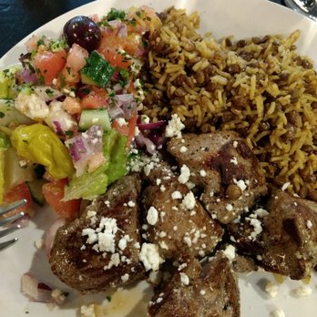 OR by Falafel Bar - Lamb souvlaki with saffron rice and Greek salad - Mediterranean Near Me - Buffalo, New York OR by Falafel Bar - Lamb souvlaki with saffron rice and Greek salad - Mediterranean Near Me - Buffalo, New York