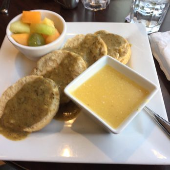 Good Life Cafe - vegan biscuits and gravy with fruit and grits - Vegan Near Me - Columbia, South Carolina Good Life Cafe - vegan biscuits and gravy with fruit and grits - Vegan Near Me - Columbia, South Carolina