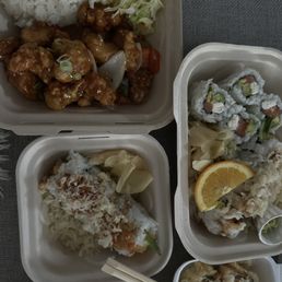 Mango chicken bento box, shrimp tempura roll, Philadelphia Roll