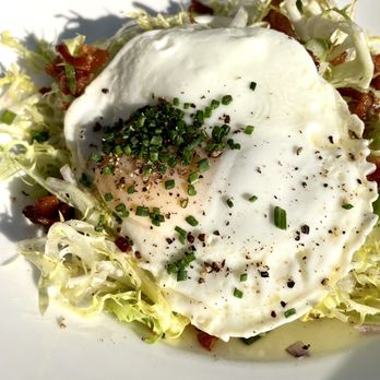 Central Michel Richard - Salad Lyonnaise $17. Fresh and lightly tossed w vinaigrette. - New American Near Me - Washington, DC, District of Columbia Central Michel Richard - Salad Lyonnaise $17. Fresh and lightly tossed w vinaigrette. - New American Near Me - Washington, DC, District of Columbia