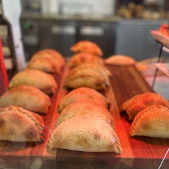 Emilia's Bakehouse Cafe - Braised Brisket Empanada - Coffee & Tea Near Me - Melville, New York Emilia's Bakehouse Cafe - Braised Brisket Empanada - Coffee & Tea Near Me - Melville, New York