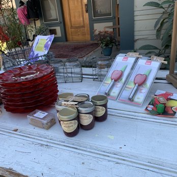 A Stone's Throw Winery - a table with wine, jars, and other items - Wineries Near Me - San Juan Capistrano, California A Stone's Throw Winery - a table with wine, jars, and other items - Wineries Near Me - San Juan Capistrano, California
